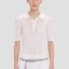 Polo-Shirt mit Rüschen in Weiß Polo-Shirt mit Rüschen in Weiß